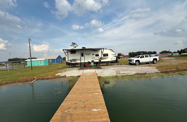 Relax or fish on this private pond and watch the most beautiful sunsets from RV