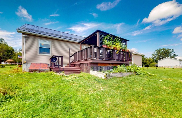 Relaxing two-story home with a deck, firepit, game room, & washer/dryer