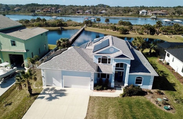 Resort-Style Living:Beautiful Beach Home with heated saltwater pool and hot tub