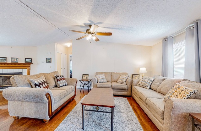 Riverfront home w/free attraction tickets, water views, firepit, deck