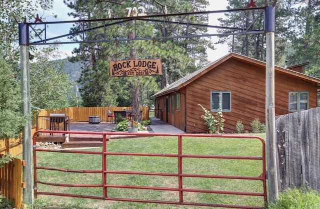 Rock Lodge Complete with Covered Parking and a Hot Tub!