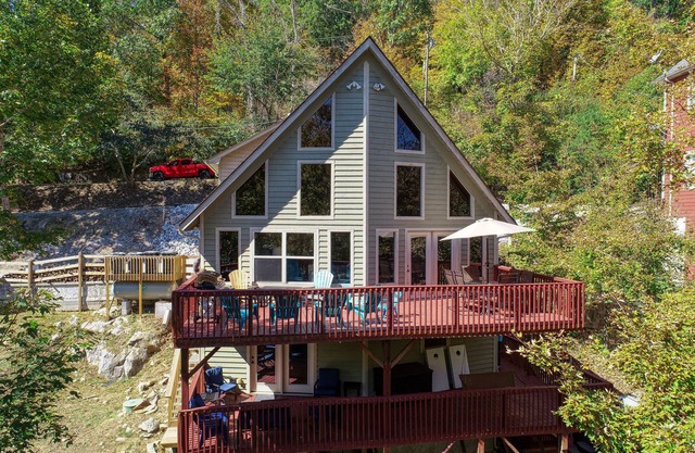 Rustic Lakefront Cabin with private double-deck dock, slide, hot tub, more!