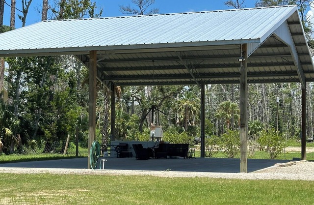 RV site- featuring covered outdoor area for enjoyment regardless of the weather!