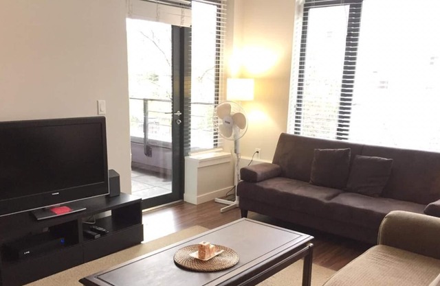 Safe and Secure Lower Lonsdale Executive Apartment