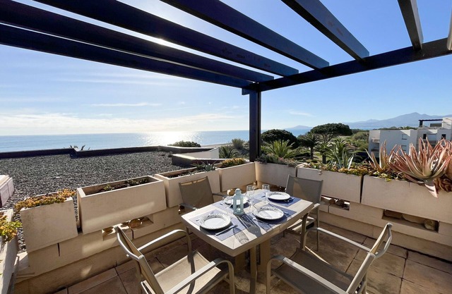 Saint-Cyprien: Seafront apt with pool, parking, and AC