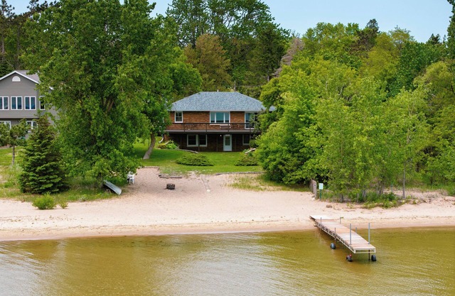 Sandy Shore Lodge- beautiful, private sand beach awaits!