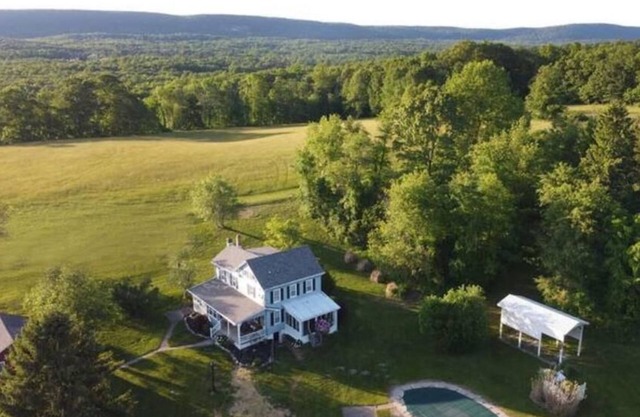 Scenic farmhouse: 100 acres