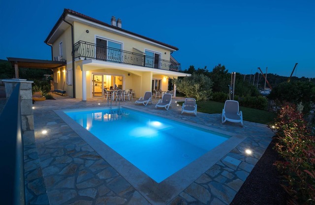 Seafront Villa Claudia with a panoramic Seaview and a swimming pool