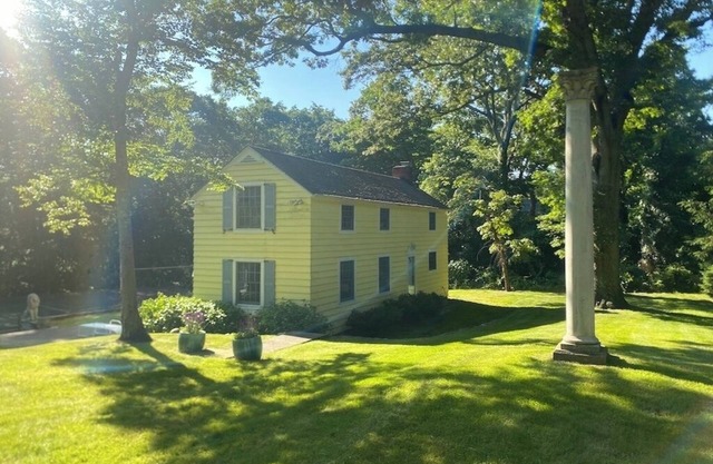 Secluded, private woodland cottage with two bedrooms and stone patio for summer!