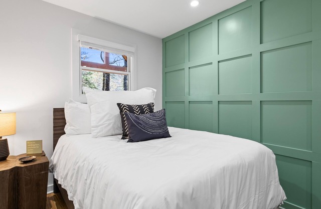 Second-floor mountain view suite with firepits, deck, & game lounge