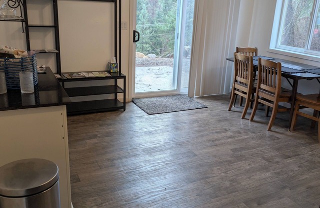 SEE YOU IN THE SPRING! Close to Coeur D' Alene yet set in a wooded atmosphere.