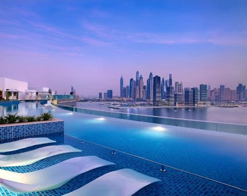 Seven Palm Jumeirah! Exceptional Rooftop Infinity Pool! Private Beach! Studio with a Balcony!