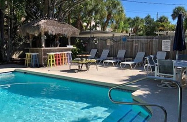 SHORT WALK TO VILLAGE, BEACH - HEATED POOL - LUSH LANDSCAPING.nTWO UNITS.