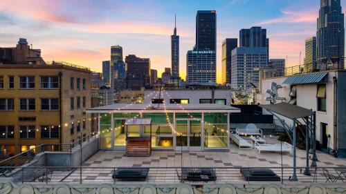 Skyline Lofts by AvantStay: a multi-level industrial-chic retreat in DTLA with rooftop views soaring ceilings steps to dining music culture