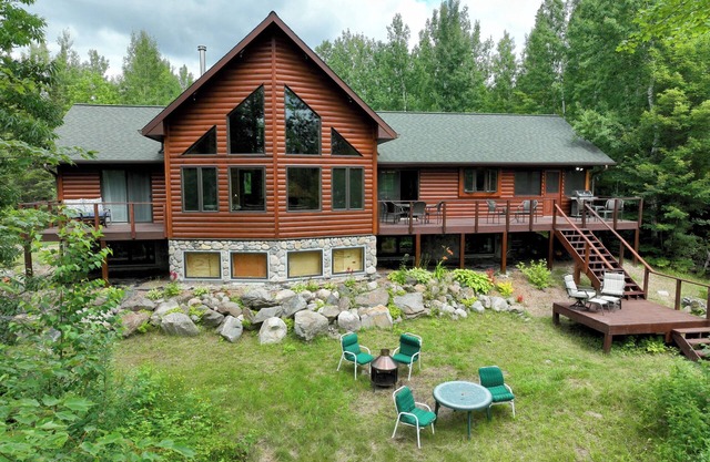 Snowmobile Retreat with Trailer Parking, Screen Porch, Sauna, 3 Bedrooms & Loft.