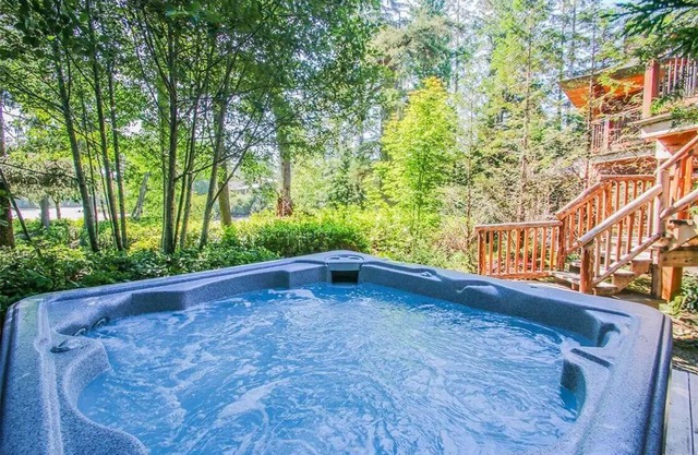 South Swell Tofino formerly Blue HeronnWaterfront home amid old growth cedars