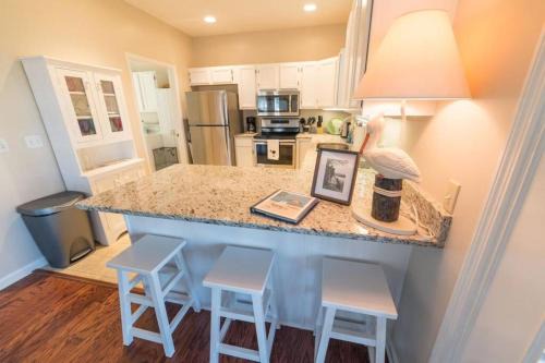 Southern Sunshine! Beach views and steps to the sand, short golf cart ride to the pool.