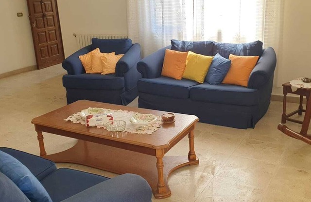 Spacious 3 BR apartment with wide windows and fireplace in the heart of Brumana