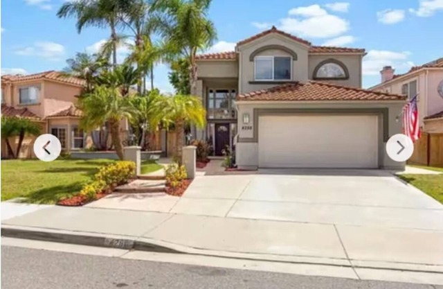 Spacious 4-bedroom house with hot tub and spa-like backyard. Home away from home