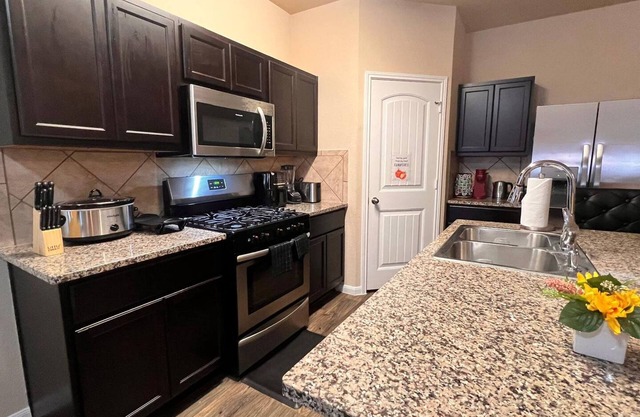 Spacious 4BR Home w Game Room Office Backyard
