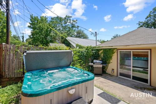 Spacious 5BR 4BA Dual Home w Hot Tub, Grill Near SoCo and Zilker by Austin Vacay