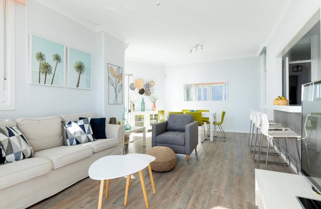 Spacious beachfront apartment with communal pool