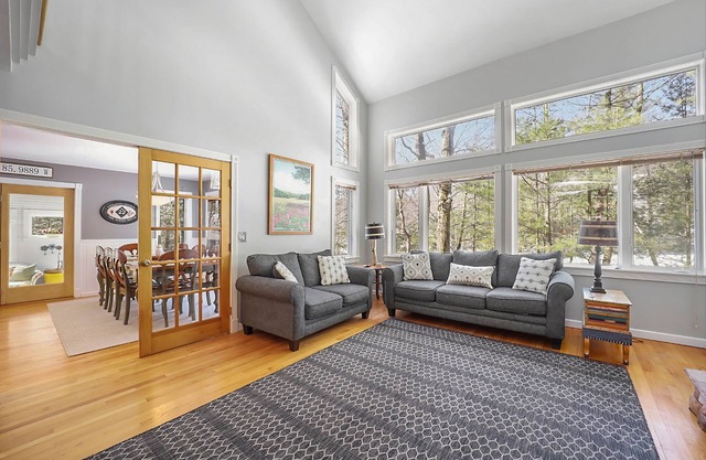 Spacious home with studio, lake access, sunroom, fireplace, W/D, & central AC