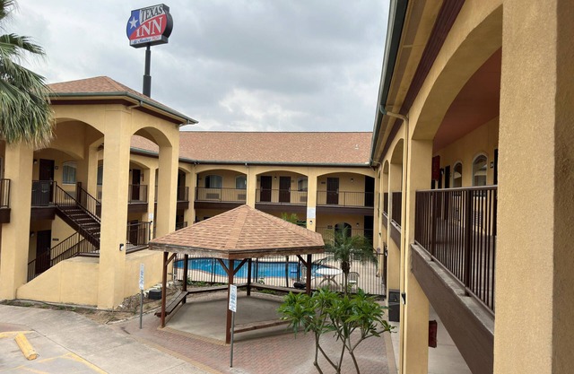 Spacious hotel suites with one king bedroom and one drawing room with Wi-Fi, AC.