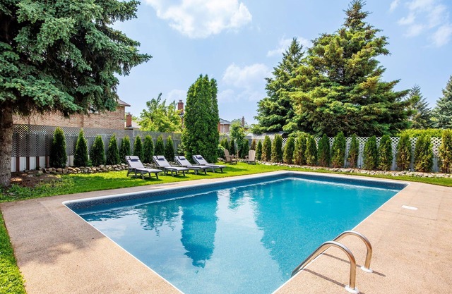 Spacious House with Large Heated Pool and Backyard.