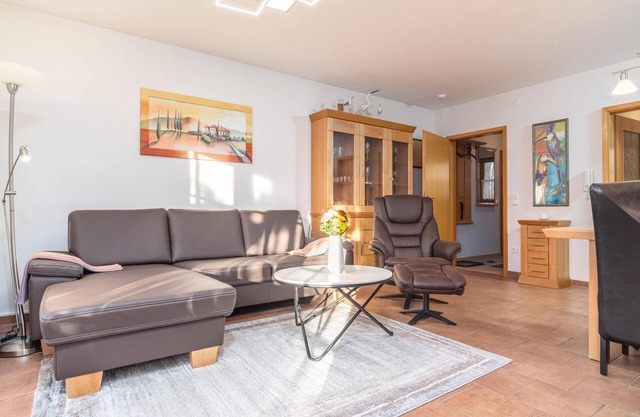 Spacious Möwennest vacation apartment with terrace, garden view and pool in Zingst
