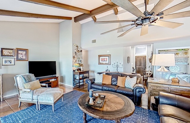 Spacious riverfront home with pool, patio, deck, & grill - great views