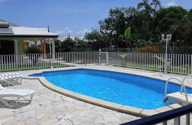 Spacious self-catering cottages with lovely terrace and shared swimming pool, in a peaceful setting.