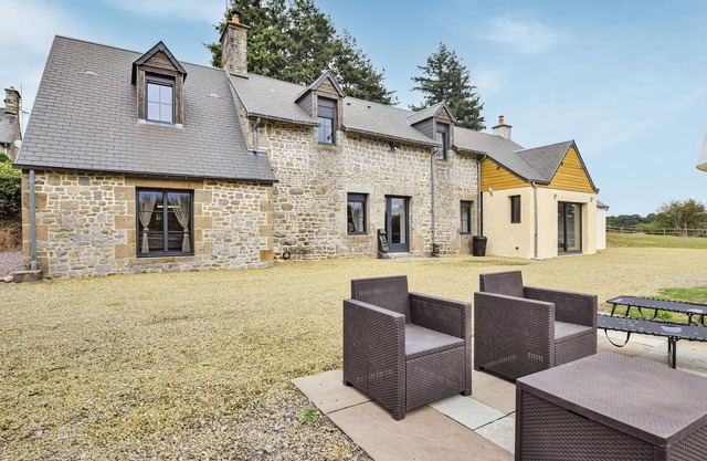 Spend a dream vacation in a spacious and modern property in Le Gast.