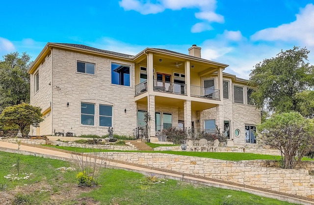 Sprawling private home with a large yard, water views, in-home gym, W/D, & AC