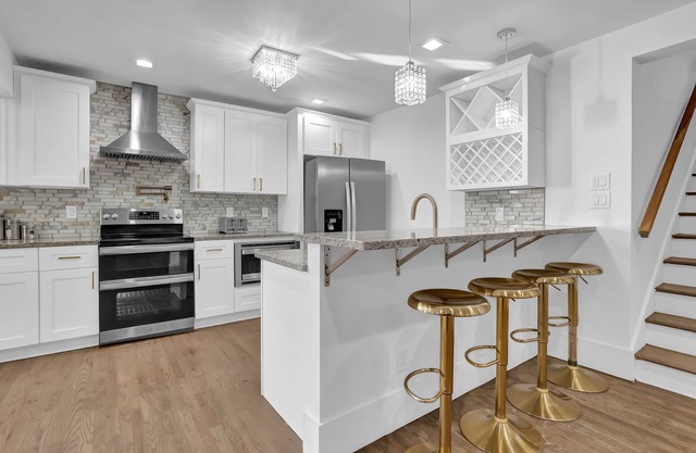 Step into a world of spacious elegance as you enter this carefully curated home