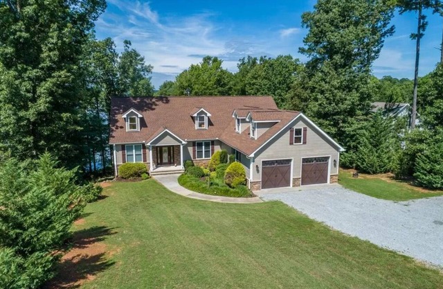 Still Waters Refuge | Main Lake Luxury w/Spectacular Sunset Views of Lake