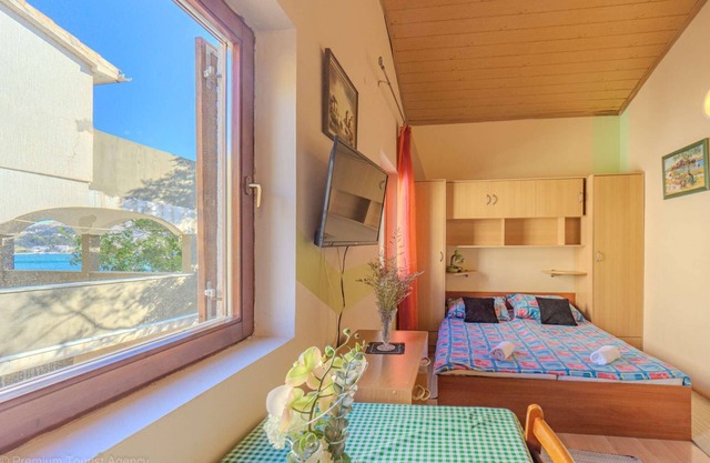Studio-Apartment with balcony, directly at the beach and free WiFi