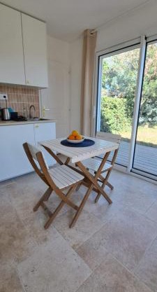 Studio confortable dans un jardin au calme