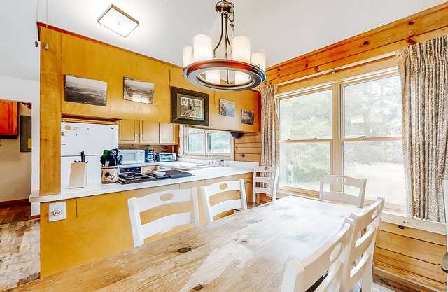 Stunning and remote riverfront home with private dock & gas grill