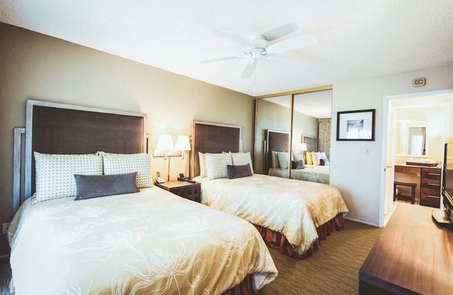 Stunning Mountain View 1BR Suites | Living Area + Kitchen | Close to Beach