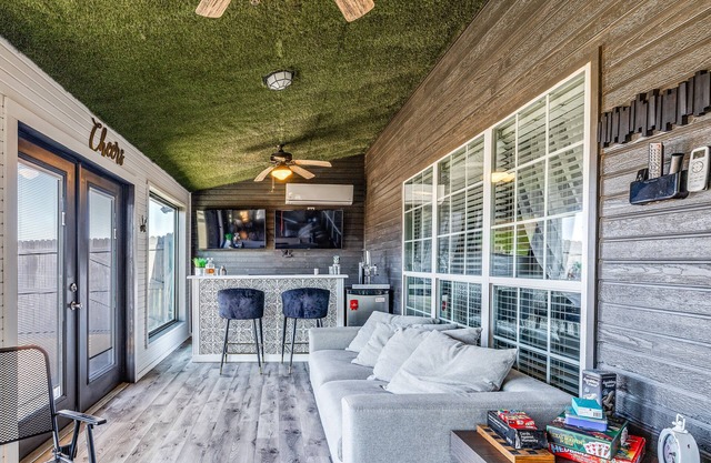 Stylish corner home with cozy interiors, a private bar, and inviting charm