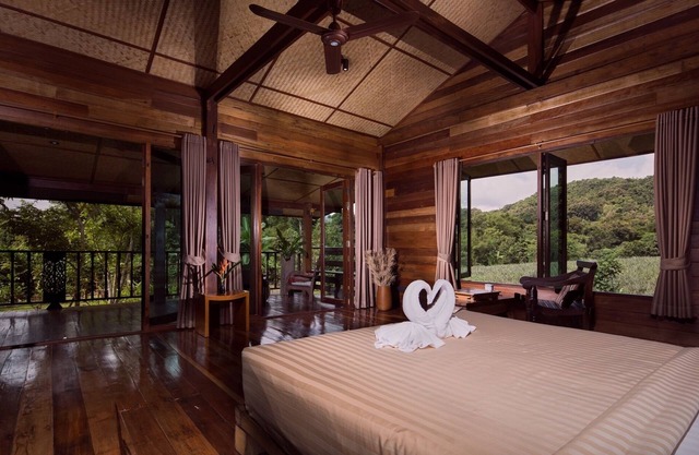 Stylish loft in stilted wooden longhouse