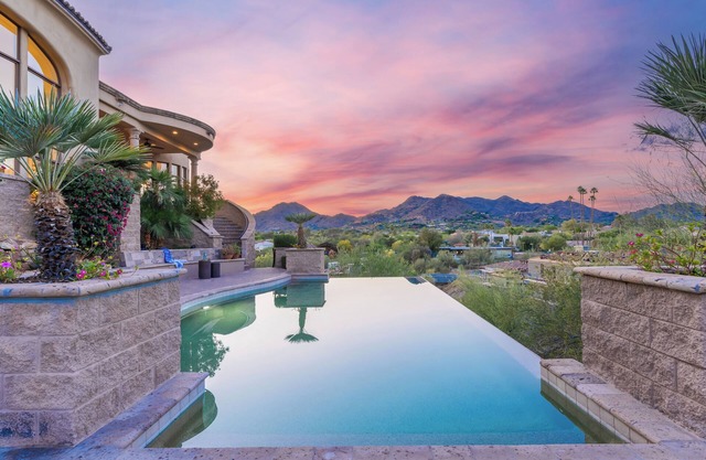 SUMMER SALE | $10M Estate w/Iconic Views, Infinity Pool, Home Theater & Style