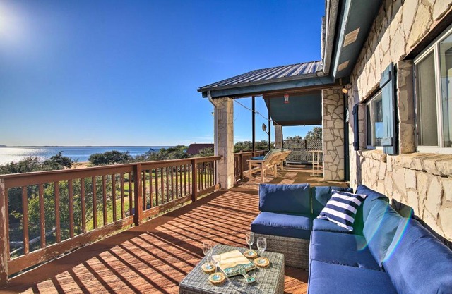 Sunny Lakefront Escape with Private Beach and Deck