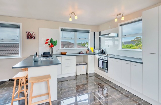 Sunny Three Bedroom Delight Upper Level