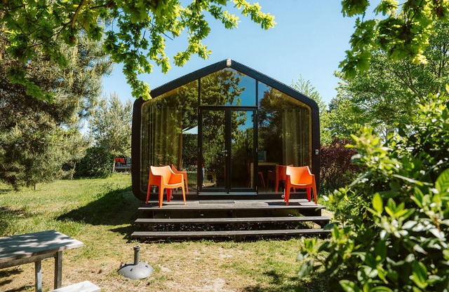 Sustainable cottage made of recycled cardboard