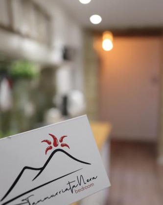 Tammurriata Nera Bedroom