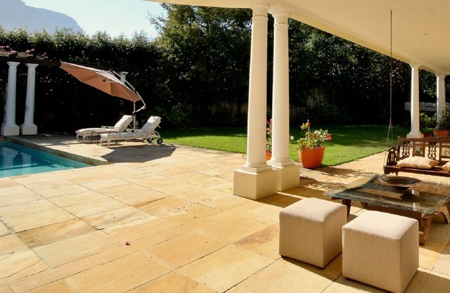 The Constantia nestles among vineyards with spectacular mountain views.