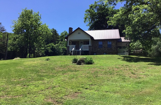 The Rock House on 100 Acres with River Access