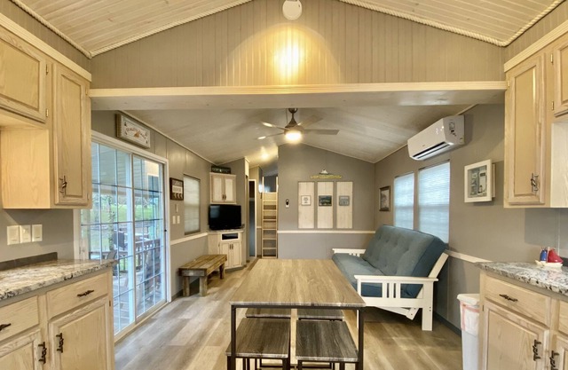 The Sailboat! Lakeside Tiny Cottage with private dock and firepit!